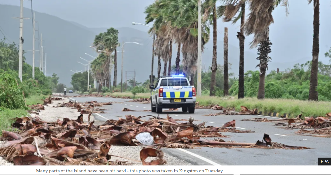Jamaicans start to reveal devastation as hurricane causes floods, power cuts and splits city in two